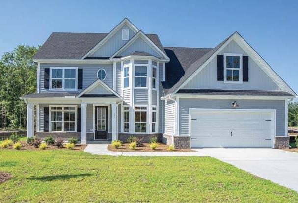 The Norman Plan by Village Park Homes. 2018 St. Jude Dream Home in The Commons in Richmond Hill, GA